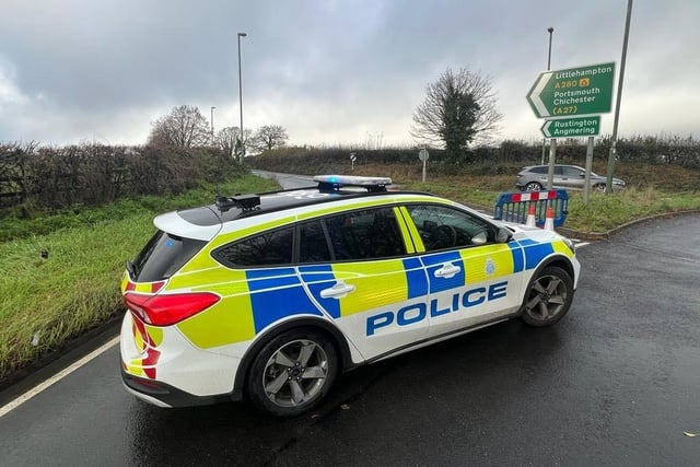 The A280 at Long Furlong is closed after an incident involving a lorry