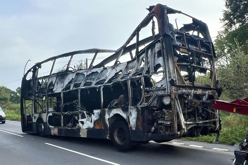 In Pictures: Bus fire in East Sussex village causes roundabout to close