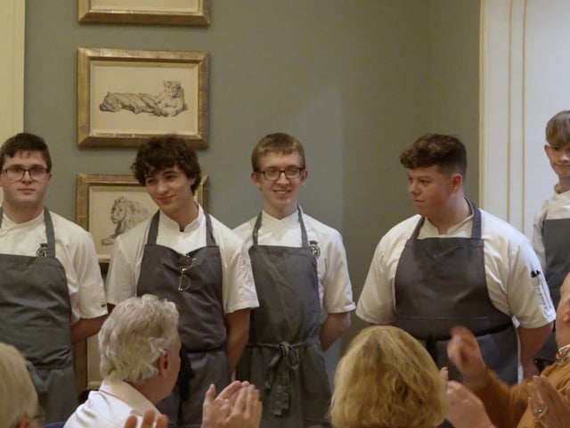 Getting a round of applause after a great meal.