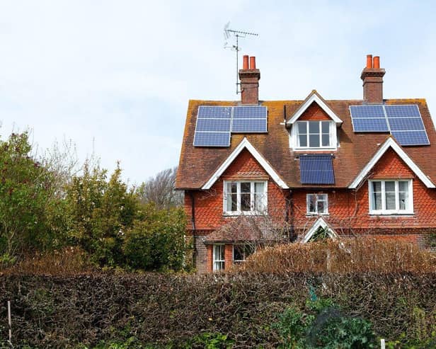 House in Sussex with rooftop solar panels.