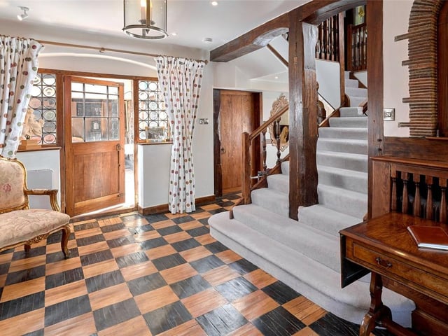 The property's amazing Arts and Crafts entrance way