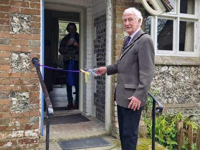 Chair John Pritchett BEM officially opening the restore Jevington Village Hall