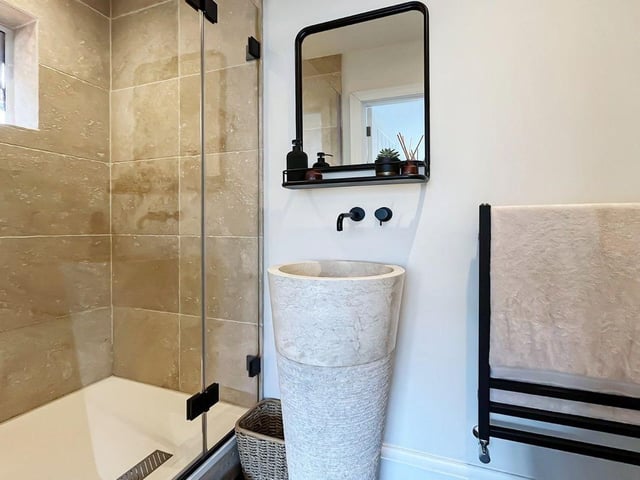 This three-bedroom detached home is situated in a peaceful road just moments from Worthing seafront. Graham Butt Estate Agents says from the moment you enter the driveway, you can immediately see what impressive accommodation is on offer.