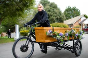 Karen Nash rides a tandem as part of a recent funeral