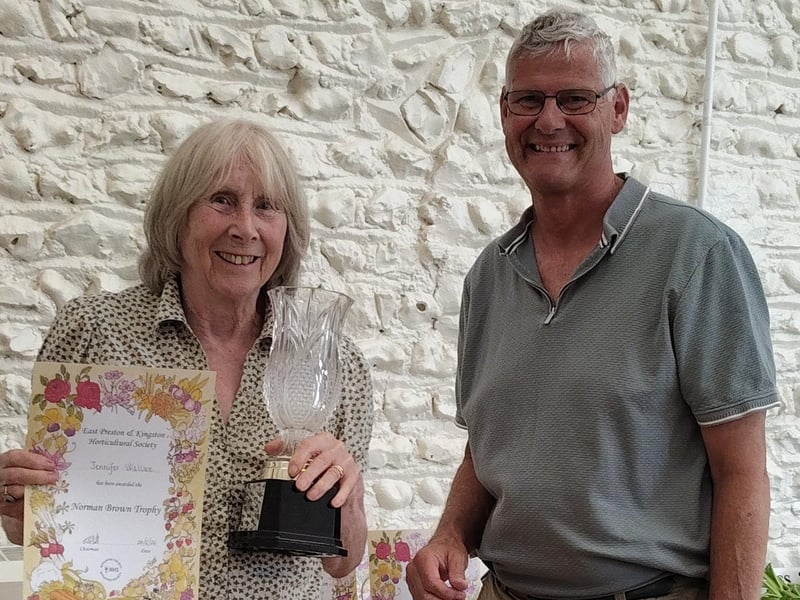 Jennifer Wallace won the Norman and Ann Brown Trophy for three different stages of development of the same variety of rose