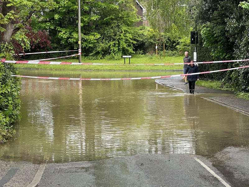 In Pictures: West Sussex road closed following heavy flooding