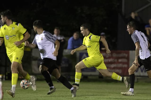 Evan Harris (centre) leads a Selsey attack against Pagham | Pictures by Chris Hatton