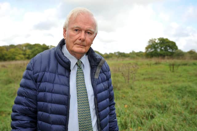 Farmer Ralph Dickson fears his plans to plant thousands of trees on his land in Cowfold as part of the Queen's Green Canopy could be wrecked by Rampion wind farm's proposals to run cabling under his fields. Photo: Steve Robards  SR2210261