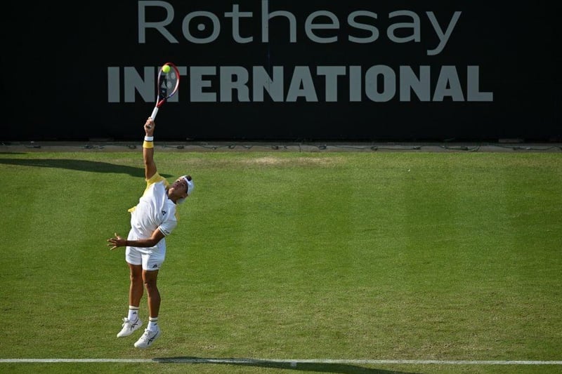 Argentina's Sebastian Baez serves to US player Tommy Paul during their men's singles round of 16 tennis match at the Rothesay Eastbourne International tennis tournament in Eastbourne, southern England, on June 28, 2023. Paul won the match 6-1, 7-6. (Photo by Glyn KIRK / AFP) (Photo by GLYN KIRK/AFP via Getty Images):Action from Wednesday's play at the Rothesay International at Devonshire Park, Eastbourne