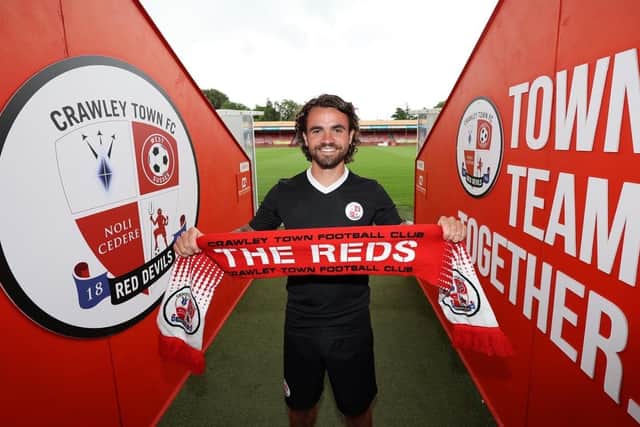 Dominic Telford signs for Crawley Town Football Club at the Broadfield Stadium in Crawley.
Credit: James Boardman/Alamy Live News