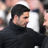 Arsenal coach Mikel Arteta shares a moment with Brighton coach Roberto De Zerbi ahead of the Premier League match at the Amex on Saturday, which Arsenal won 3-0 (Photo by Mike Hewitt/Getty Images)