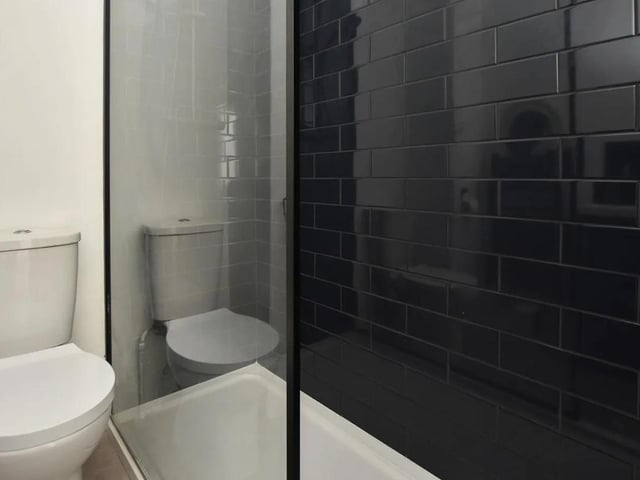 The flat has a modern fitted shower room