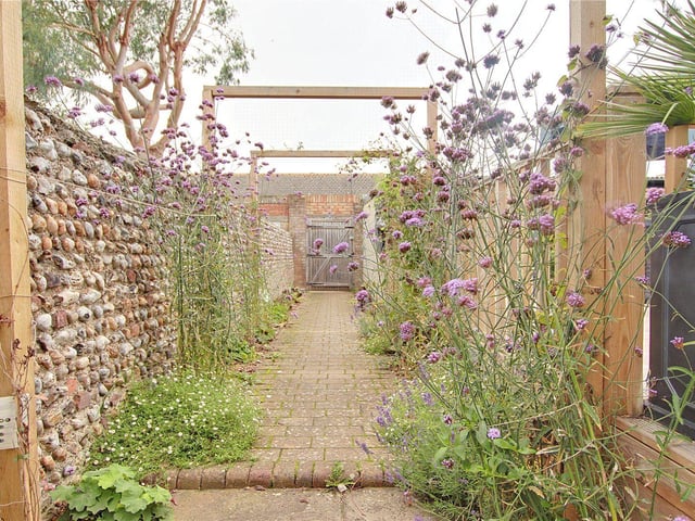 This six-bedroom, semi-detached home is packed with character. It is on the market with Michael Jones and Company with a guide price of £650,000.