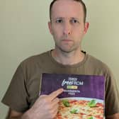 Steven Bailey holding a gluten free pizza. Photo: contributed