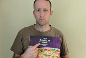 Steven Bailey holding a gluten free pizza. Photo: contributed