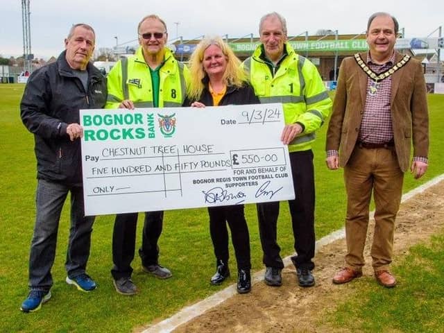 The charity's Nicky Clark was on hand to accept a cheque for £550 from the club's very own walking football team, Boulders FC, with the town's mayor