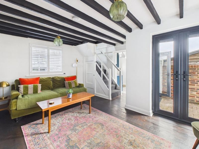 The living/dining room benefits from a dual aspect and there is direct access to the garden
