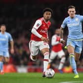LONDON, ENGLAND - JANUARY 06: Reiss Nelson of Arsenal takes on Ben White of Leeds during the FA Cup Third Round match between Arsenal and Leeds United at Emirates Stadium on January 06, 2020 in London, England. (Photo by David Price/Arsenal FC via Getty Images)