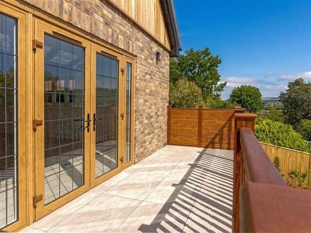 Offers in excess of £925,000 are invited for this new luxury property in Mill Lane, High Salvington. It has beautiful views over the South Downs, versatile and spacious accommodation.