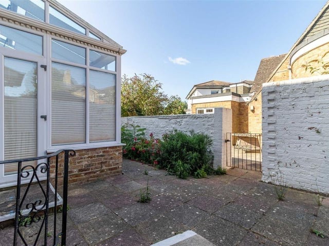 There are attractive patio areas in the west-facing garden