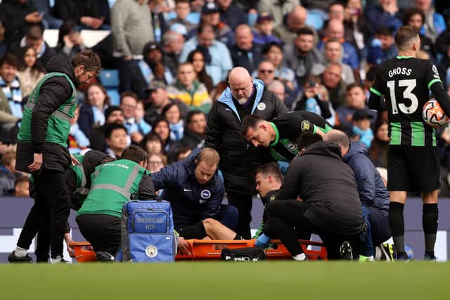 Solly March, who has been Brighton’s emergency left-back, had to be stretchered off the pitch after suffering a serious-looking ankle injury at Manchester City. (Photo by Charlotte Tattersall/Getty Images)