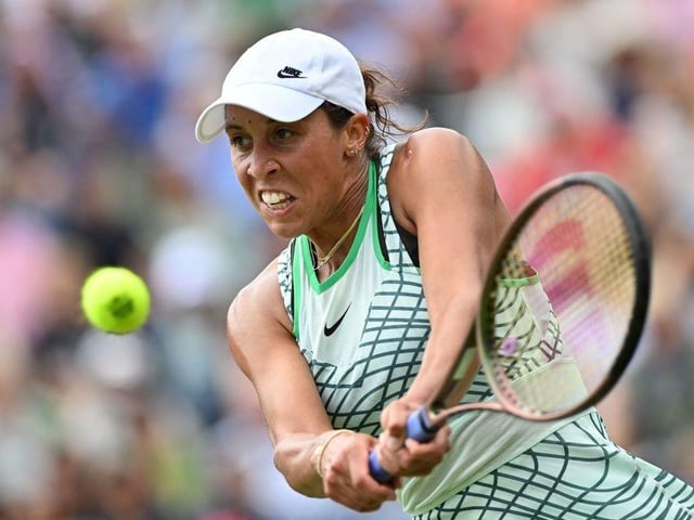 US player Madison Keys returns to Russia's Daria Kasatkina during their women's singles final tennis match at the Rothesay Eastbourne International tennis tournament in Eastbourne, southern England, on July 1, 2023. (Photo by Glyn KIRK / AFP) (Photo by GLYN KIRK/AFP via Getty Images):Action from Saturday's finals at the Rothesay tennis international at Devonshire Park, Eastbourne