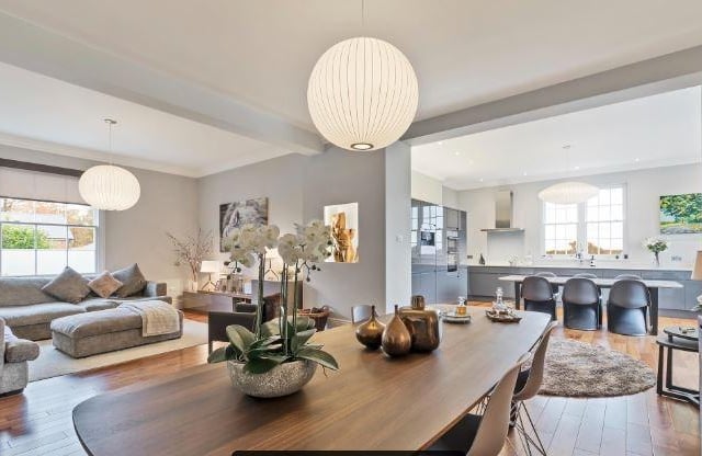 A stylish family/dining room adjoins the kitchen