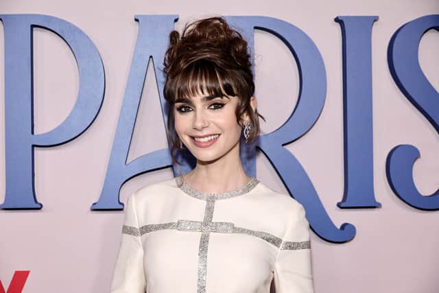 Lily Collins attends the Emily In Paris French Consulate Red Carpet at French Consulate on December 15, 2022 in New York City. (Photo by Jamie McCarthy/Getty Images for Netflix)
