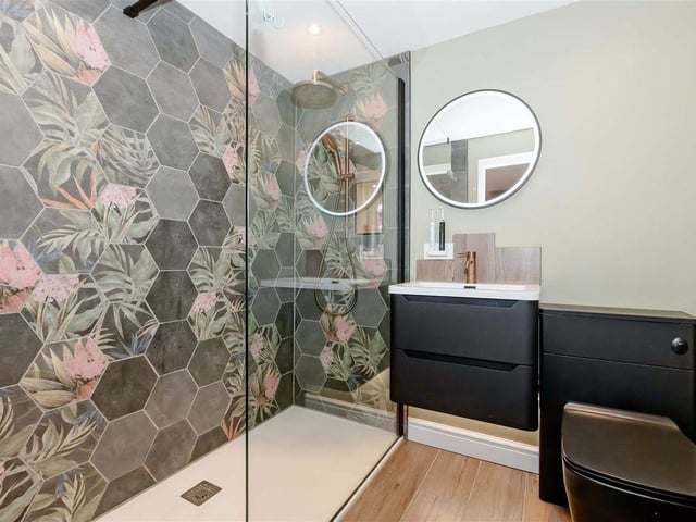 There is an en-suite shower room and a separate family bathroom