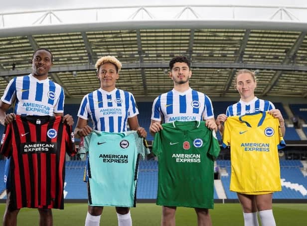 Brighton and Hove Albion players show the new kit for the 2022-23 campaign