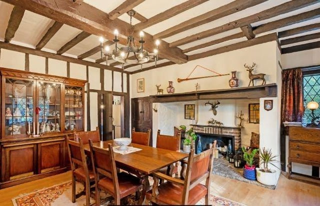 The dining room also has a feature inglenook fireplace