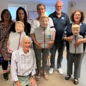 Wendy, Kimberley, Celia, June and Malcolm with David Slade, chairman of Littlehampton Wave Life Saving Club, second right, and the manikins used for first aid training