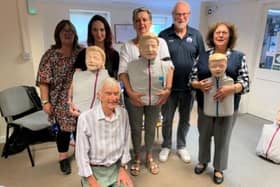 Wendy, Kimberley, Celia, June and Malcolm with David Slade, chairman of Littlehampton Wave Life Saving Club, second right, and the manikins used for first aid training