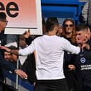 Interim Chelsea manager Frank Lampard (right) admitted his team were 'well beaten' by Roberto De Zerbi's Brighton. (Photo by BEN STANSALL/AFP via Getty Images)
