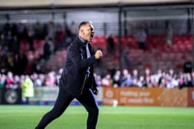 Crawley Town boss Scott Lindsey doing a trademark celebration after another win at the Broadfield Stadium. Picture: Eva Gilbert