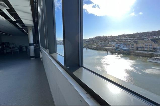 The top floor of the building boasts impressive views of the town and river.