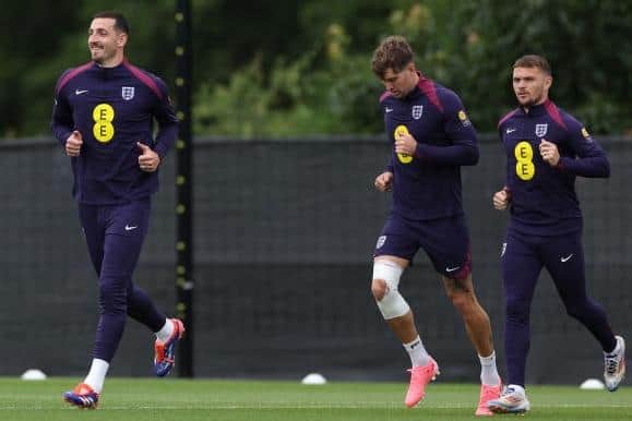 Brighton are reportedly interested in signing Manchester City defender John Stones (middle), pictured with Lewis Dunk and Kieran Tripper at the England camp during Euro 2024 (Photo by ADRIAN DENNIS/AFP via Getty Images)