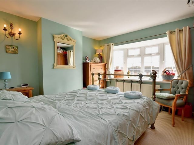 This two-bedroom cottage is on the market at £600,000 with Cubitt & West. This is a rare opportunity to own a charming riverside cottage within the desirable conservation area of historic Arundel.