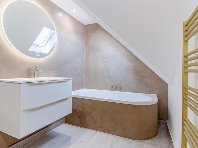 Offers in excess of £900,000 are invited for this new luxury property in Mill Lane, High Salvington. It has beautiful views over the South Downs, versatile and spacious accommodation.