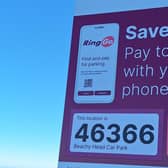 A QR code has been placed on a parking sign in Eastbourne. Photo: EBC