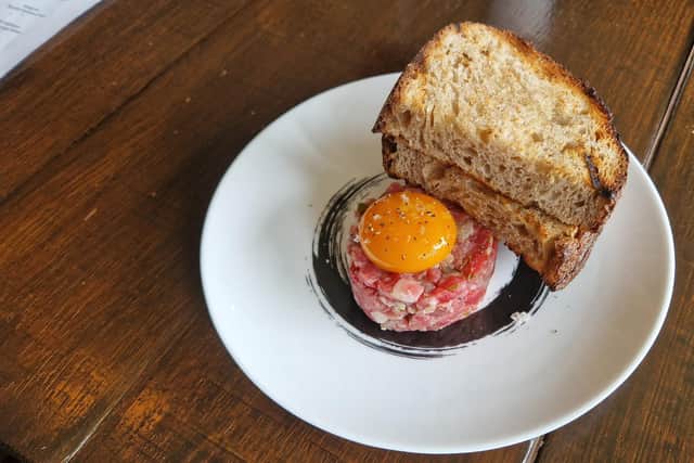 A 50 Day Aged Beef Tartar, Confit Yolk, Pickles & Sourdough at Carne, Hove