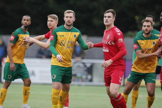 Action from Horsham's 2-2 draw with nine-man Aveley