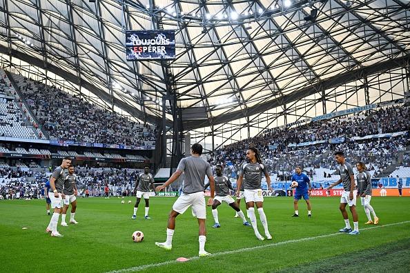 Marseille players warm up prior to the UEFA Europa League match between Olympique de Marseille and Brighton & Hove Albion at Orange Velodrome