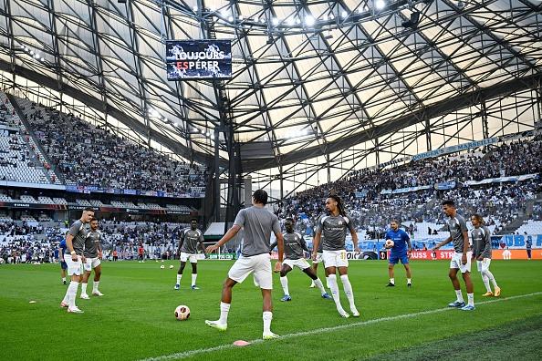 Marseille players warm up prior to the UEFA Europa League match between Olympique de Marseille and Brighton & Hove Albion at Orange Velodrome
