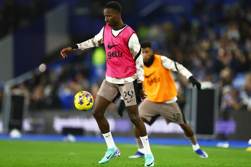 Pape Matar Sarr of Tottenham Hotspur warms up prior to the Premier League match between Brighton & Hove Albion and Tottenham Hotspur at American Express Community Stadium.