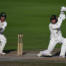 Tom Price of Sussex hits out as wicketkeeper Mitch Hay of Nottinghamshire looks on on day two of the Rothesay County Championship Division 1 match at Hove (Photo by Mike Hewitt/Getty Images)