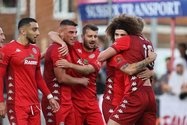 Worthing celebrate Lewis White's goal in the FA Cup defeat to Eastbourne Borough. Picture by Mike Gunn