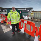 Deeday White Jr, owner of Skinners Sheds, pictured in front of his warehouse in Bulverhythe Road, St Leonards, on March 17 after it was flooded by sewage on February 3.