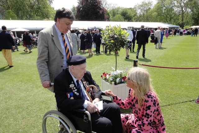 D-Day veteran Bob Piper, from Southwater, met TV presenter Gaby Roslin at the Buckingham Palace garden party