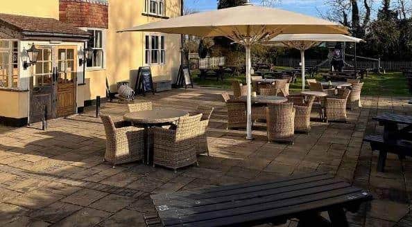 The Black Horse pub at Hookwood has a large garden with a spacious patio area